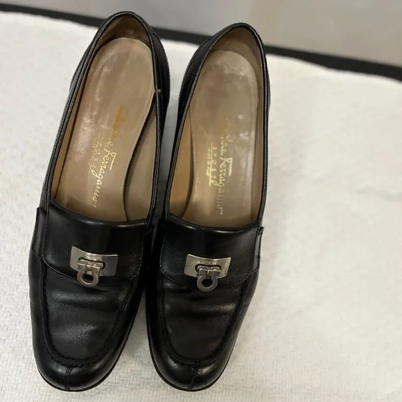 Salvatore Ferragamo Black Loafer Flats with silver logo hardware. Corpcore